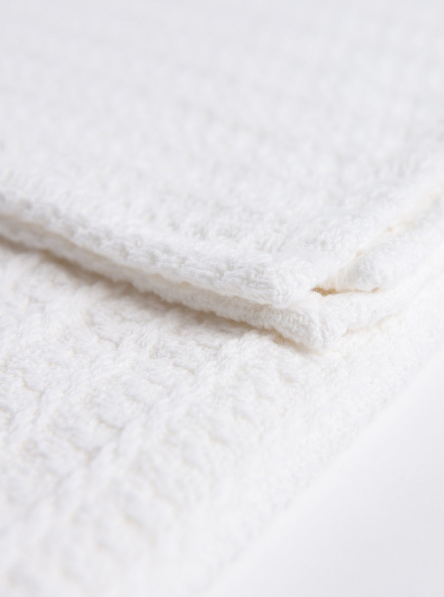 Add comfort to any corner with this cloud-soft throw blanket.